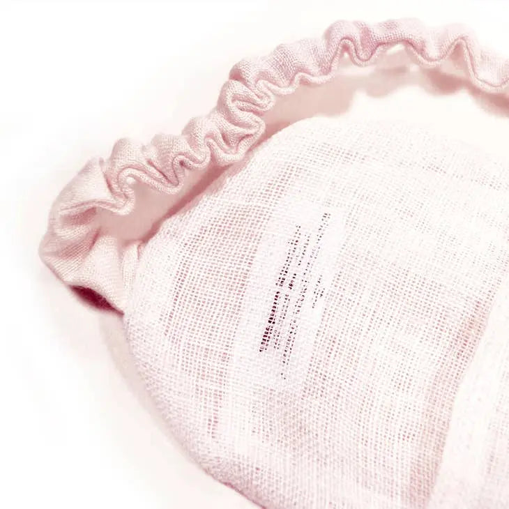 Masque quartz rose Relaxation Yeux en Quartz Rose, doux tissu rose, idéal pour apaiser le stress et favoriser un sommeil réparateur.
