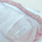 Masque quartz rose relaxation yeux en quartz rose, avec tissu doux et élastique, conçu pour apaiser et favoriser le sommeil.