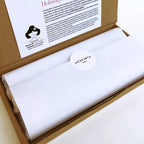 Boîte contenant un Masque quartz rose pour le bien-être.