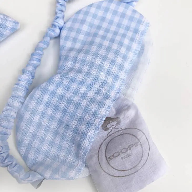 Masque yeux relaxant en tissus à carreaux bleus, conçu pour apaiser et détendre les yeux avec graines de lin bio.