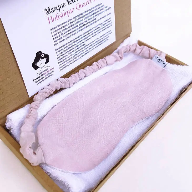 Masque quartz rose relaxation yeux en quartz rose, doux et apaisant, présenté dans une élégante boîte.